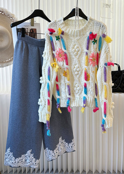 Suéteres de punto cable bordados en blanco con diseño original para invierno