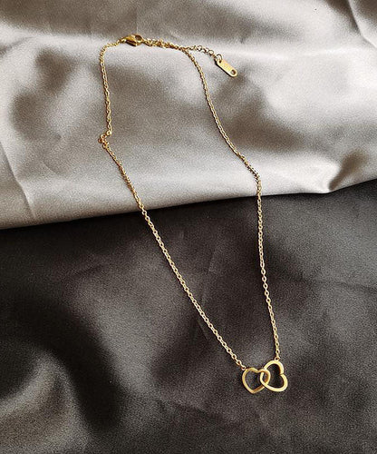 Originale Halskette mit doppeltem Herzanhänger aus Gold-Kupfer-Legierung