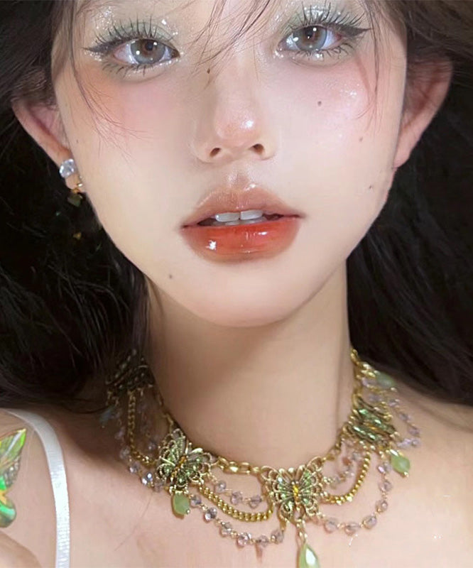 Collar con colgante de mariposa con borla y circonitas doradas en plata de ley verde original