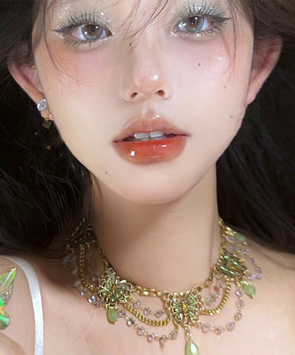 Collar con colgante de mariposa con borla y circonitas doradas en plata de ley verde original