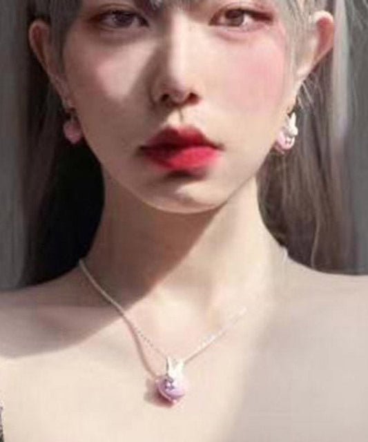 Collar original con colgante de conejito brillante de circonita rosa en plata de ley