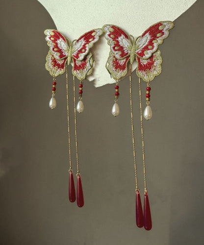 Horquilla original con borla de mariposa bordada y sobredorada en plata de ley roja