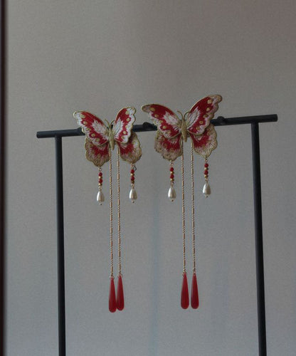 Horquilla original con borla de mariposa bordada y sobredorada en plata de ley roja