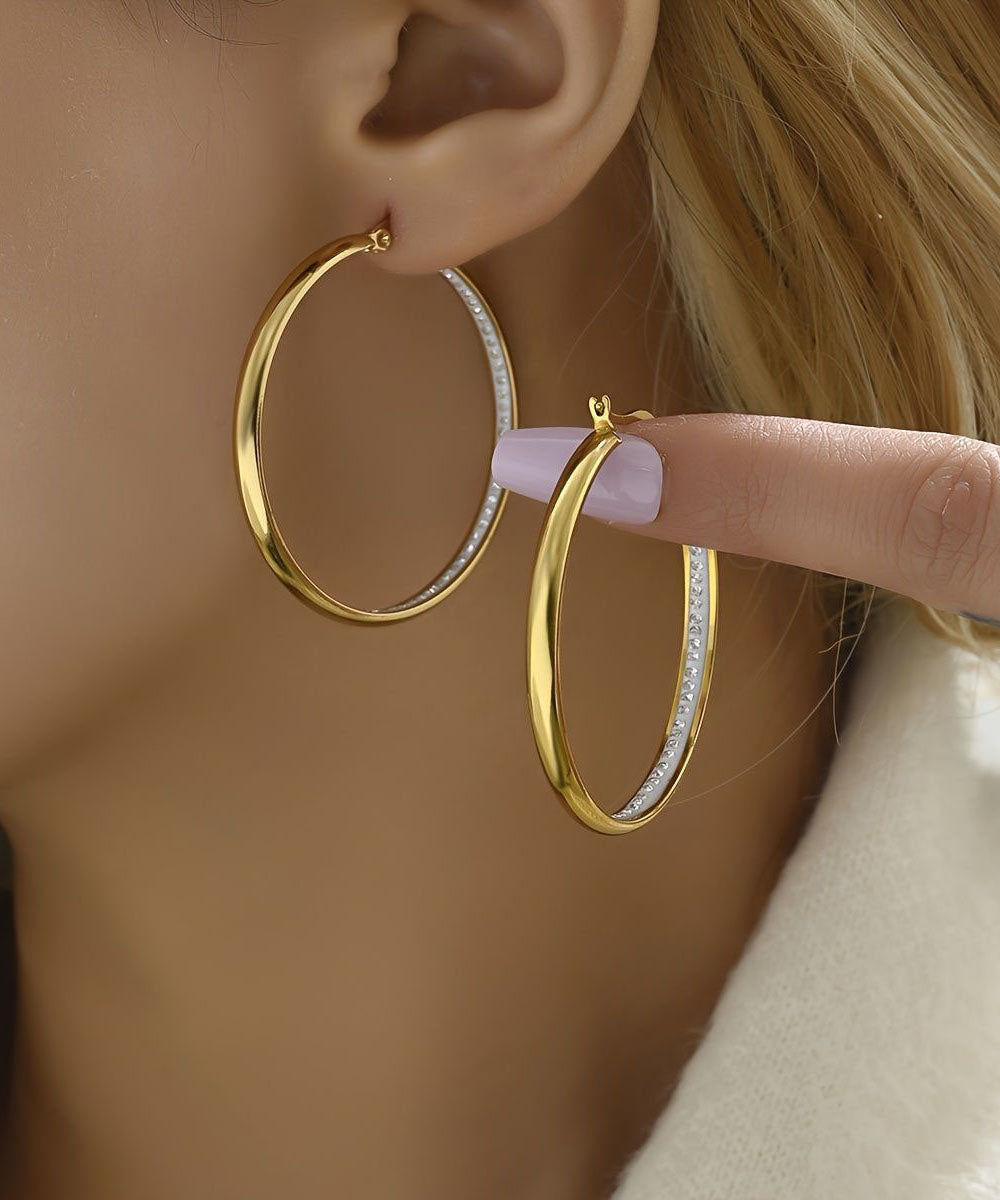 Pendientes de aro extragrandes de cobre dorado con circonitas