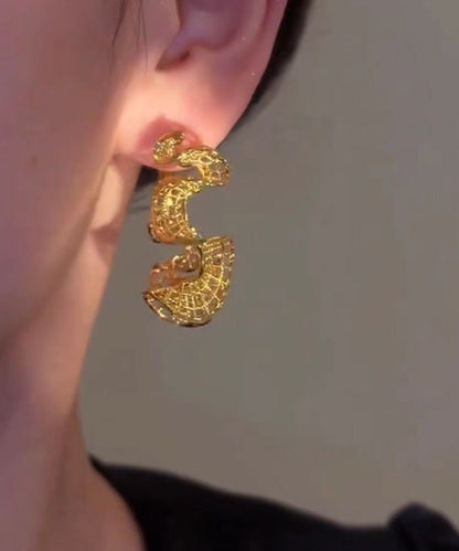 Übergroße, gold- und silberübergoldene, S-förmige Creolen mit Aussparungen in S-Form