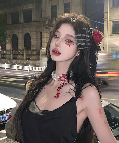 Horquilla para el pelo izquierda con forma de mano de esqueleto de rosa roja de gran tamaño