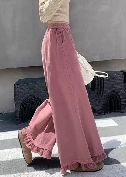 Rosa Cordhose mit Taschen, elastischem Bund und Rüschen für den Herbst