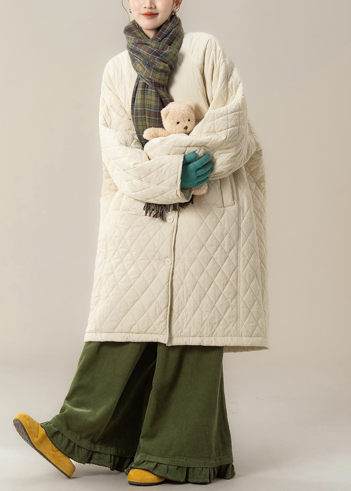 Parka de invierno de algodón con bolsillos a cuadros y cuello redondo en color albaricoque de talla grande