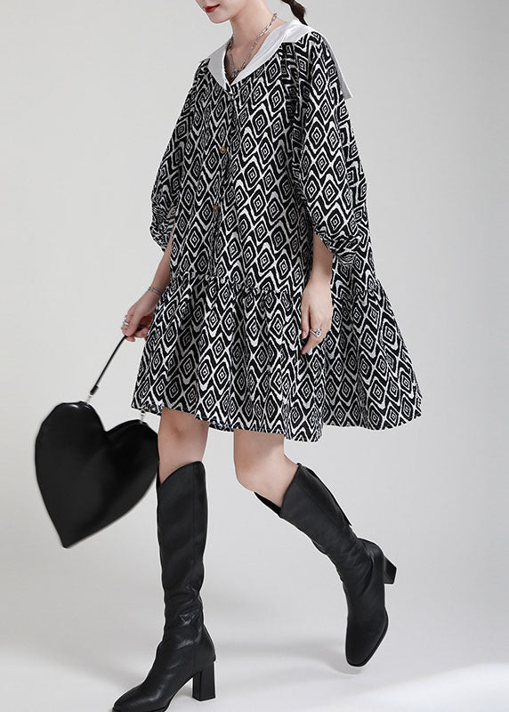 Plus Size Schwarzes Patchwork-Kleid mit asymmetrischem Design und Puffärmeln