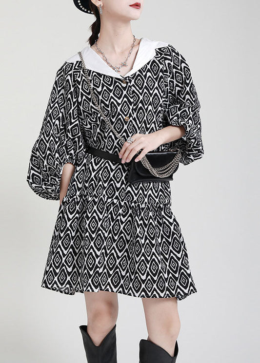 Plus Size Schwarzes Patchwork-Kleid mit asymmetrischem Design und Puffärmeln