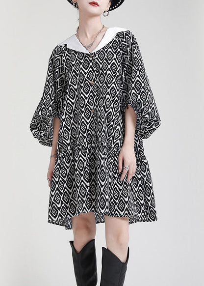 Plus Size Schwarzes Patchwork-Kleid mit asymmetrischem Design und Puffärmeln