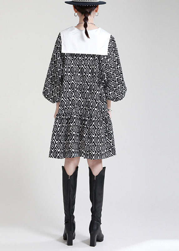 Plus Size Schwarzes Patchwork-Kleid mit asymmetrischem Design und Puffärmeln