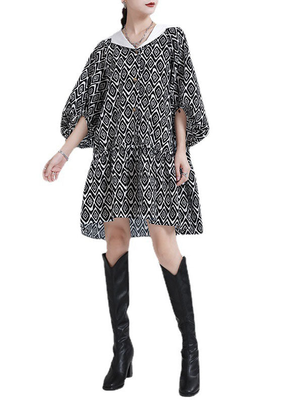 Plus Size Schwarzes Patchwork-Kleid mit asymmetrischem Design und Puffärmeln