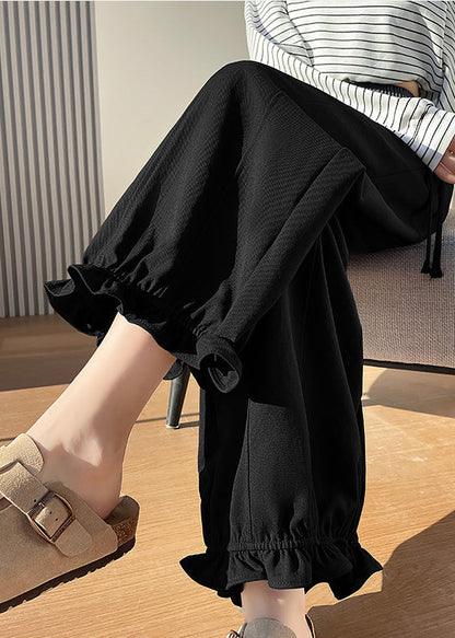 Schwarze Baumwollhose in Übergröße mit elastischem Bund und Rüschen, Frühling