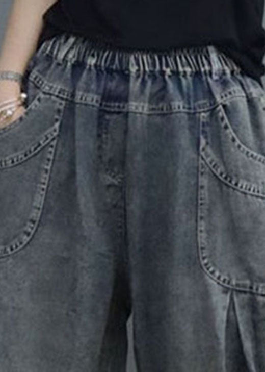 Plus Size Blaue elastische Taille Taschen Denim Hose Frühling