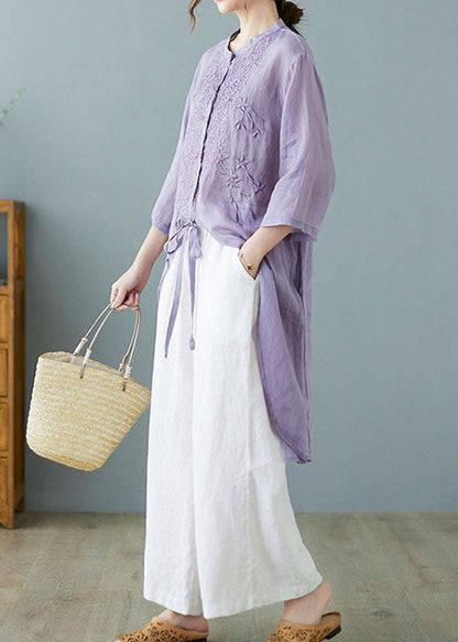 Blusa de lino con bolsillos y botones morados de media manga