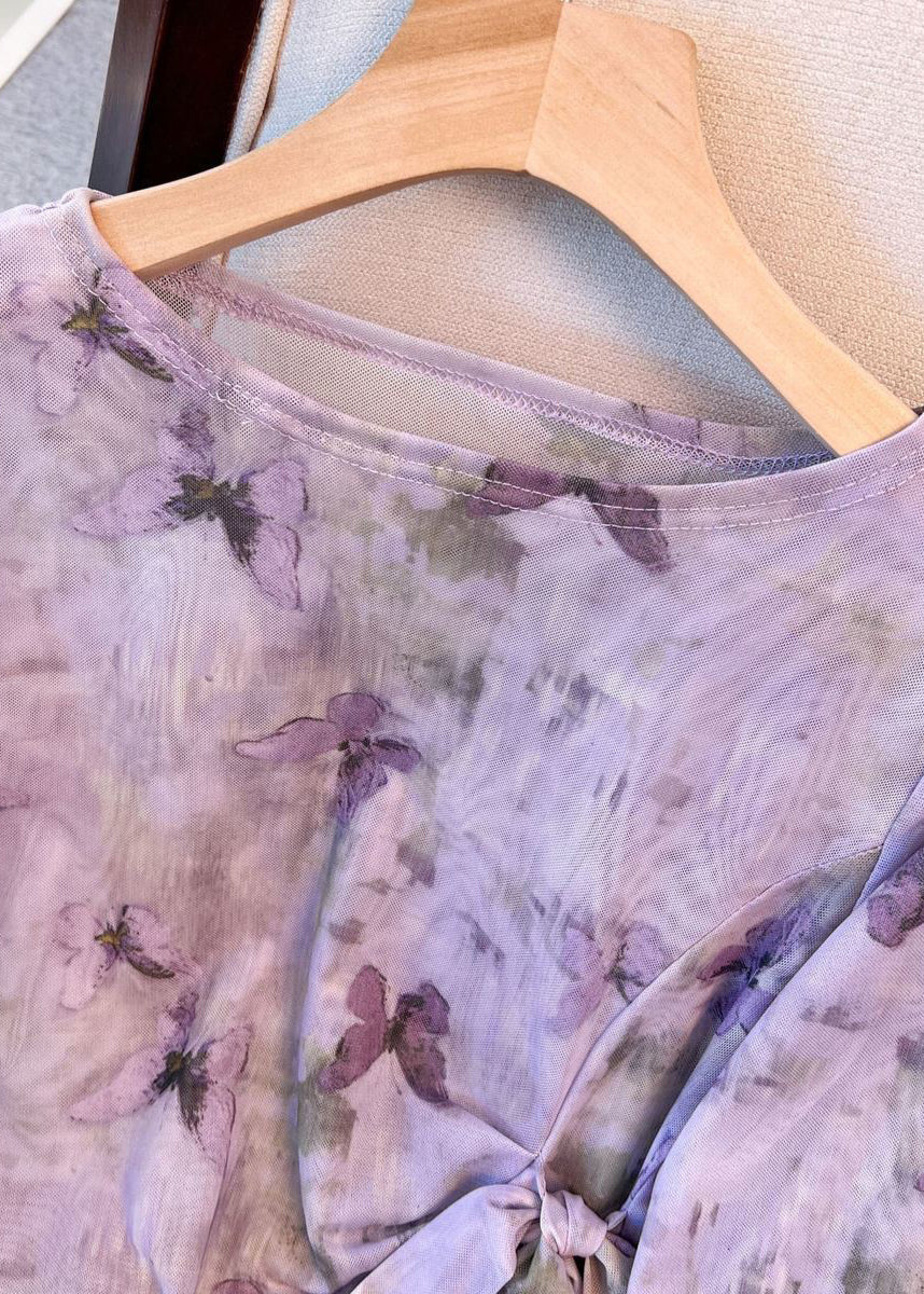 Camiseta de tul morada con cordones laterales abiertos y cuello redondo