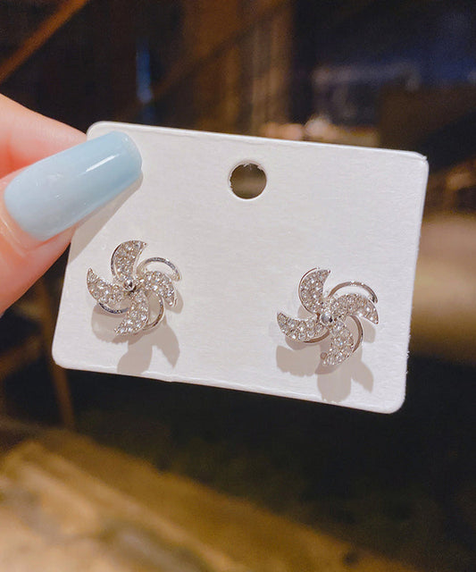 Pendientes de botón florales con circonitas doradas y plata de ley