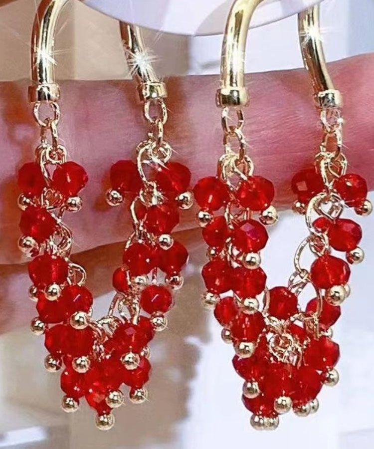 Pendientes de aro con borlas y cuentas de cristal verde regular