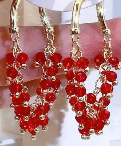 Pendientes de aro con borlas y cuentas de cristal verde regular