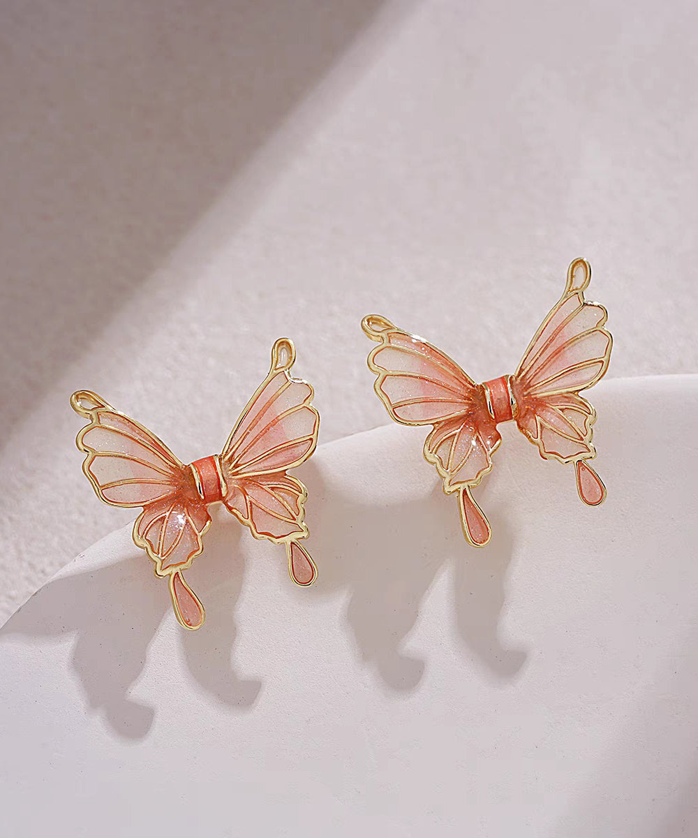 Pendientes de mariposa de resina de cobre naranja de tamaño regular