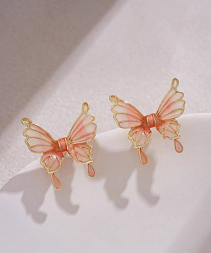 Pendientes de mariposa de resina de cobre naranja de tamaño regular