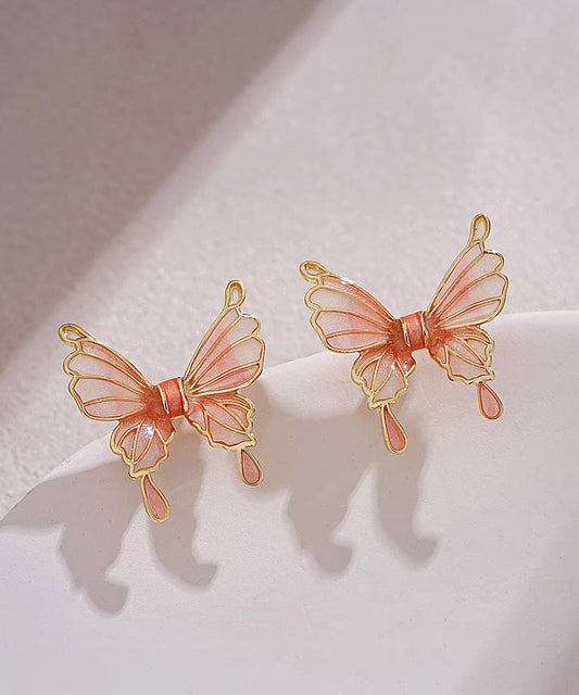 Pendientes de mariposa de resina de cobre naranja de tamaño regular