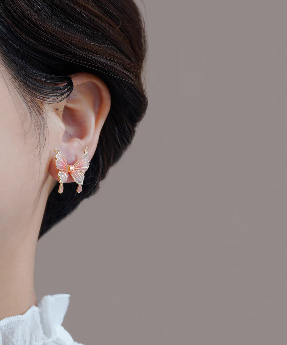 Pendientes de mariposa de resina de cobre naranja de tamaño regular