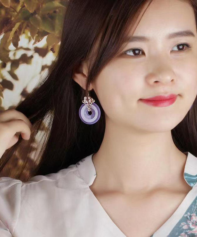 Pendientes colgantes de calcedonia con flor de concha en oro morado de 24 quilates