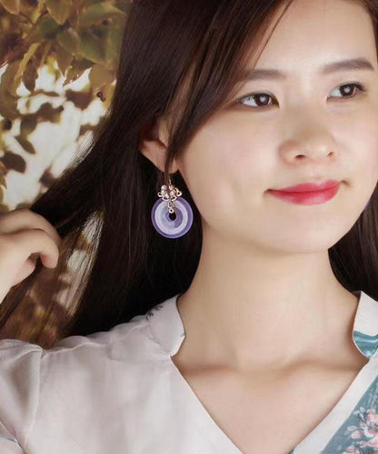 Pendientes colgantes de calcedonia con flor de concha en oro morado de 24 quilates