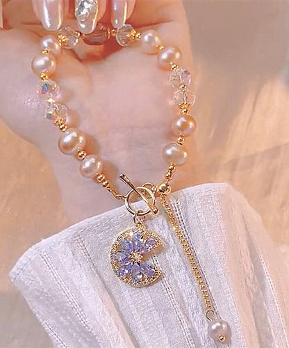 Normales lilafarbenes Charm-Armband aus Sterlingsilber mit Kristallperlen und Quaste