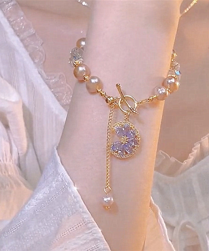 Normales lilafarbenes Charm-Armband aus Sterlingsilber mit Kristallperlen und Quaste