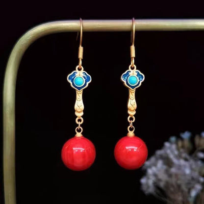 Pendientes colgantes de piedra preciosa roja regular y piedra preciosa turquesa