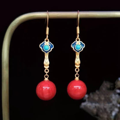 Pendientes colgantes de piedra preciosa roja regular y piedra preciosa turquesa