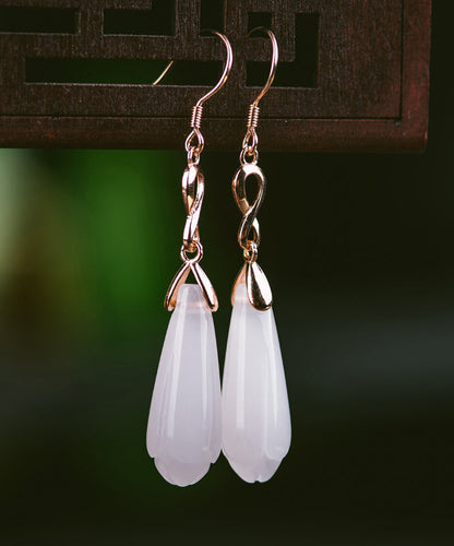 Pendientes colgantes con borlas de flor de magnolia de plata de ley y seda