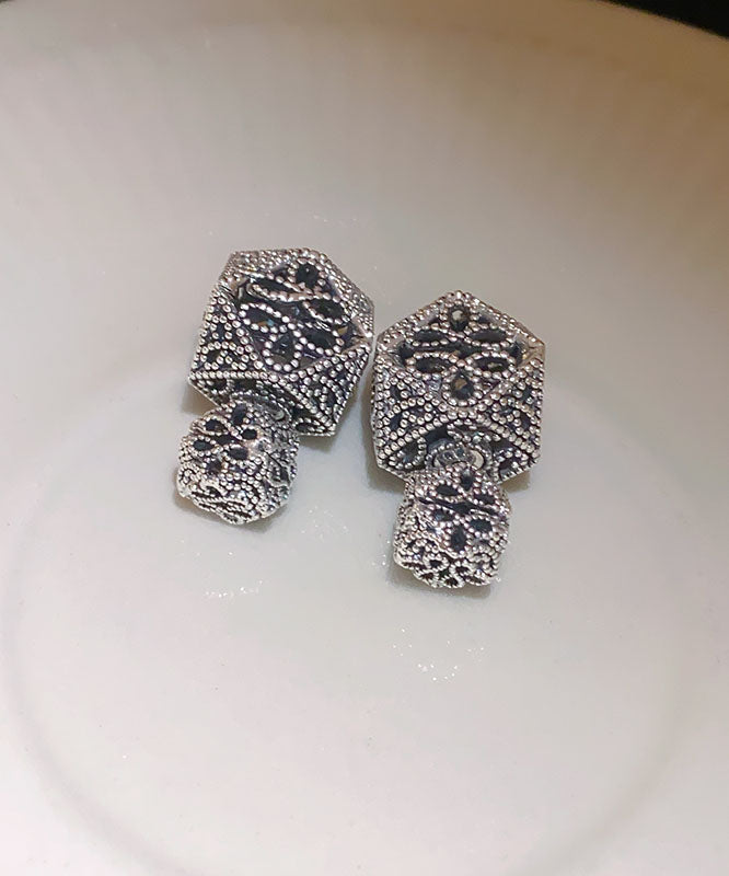 Pendientes geométricos ahuecados de cobre negro retro