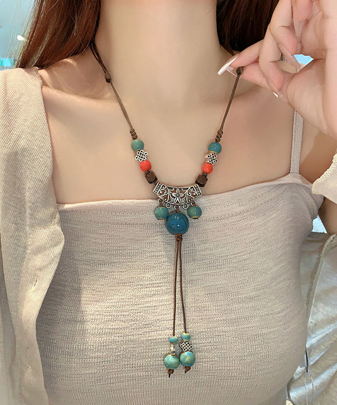 Retro Braune Halskette mit Quastenanhänger aus Hanfseil und Keramik