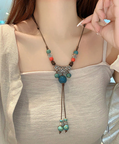 Retro Braune Halskette mit Quastenanhänger aus Hanfseil und Keramik