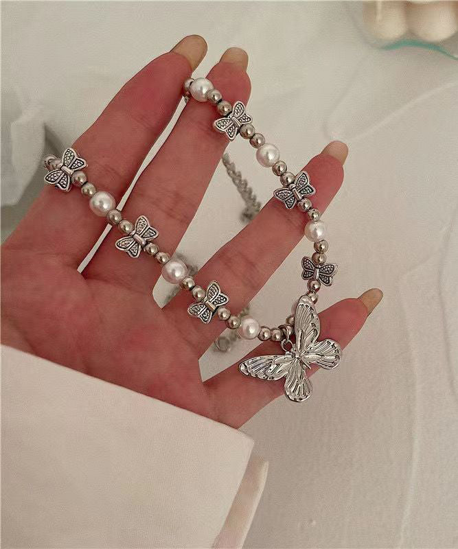 Retro-Halskette mit Schmetterlingsanhänger aus Edelstahl