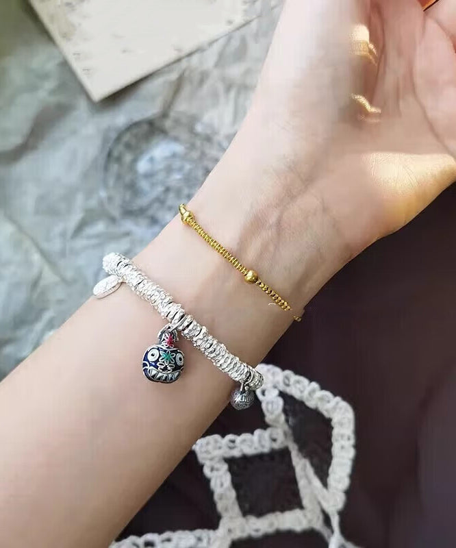 Pulsera con dije de bestia devoradora de oro, plata de ley y seda retro
