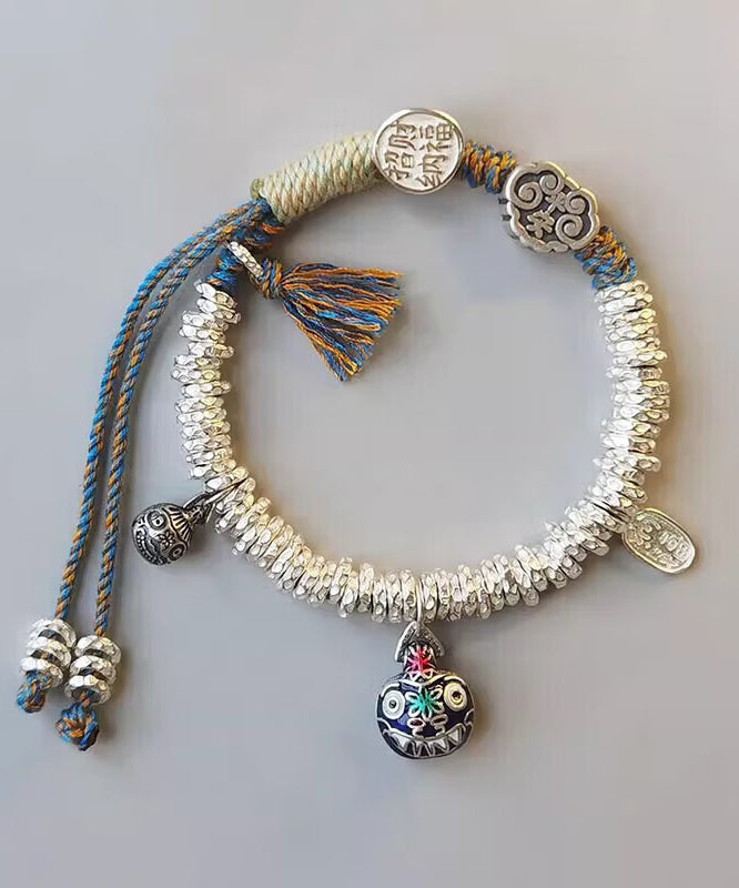 Pulsera con dije de bestia devoradora de oro, plata de ley y seda retro