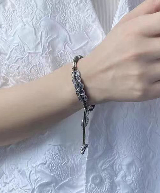 Pulsera de seda retro con borlas y cinco monedas del emperador en plata de ley