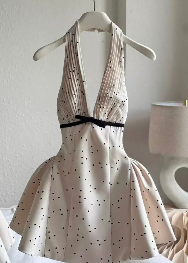 Vestido mini sexy de algodón con lunares, sin mangas, con escote en V y espalda descubierta en beige