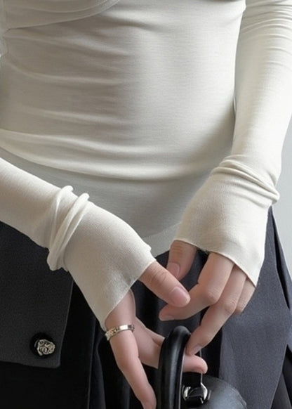 Tops sexis blancos de cuello alto con patchwork y hombros descubiertos para primavera