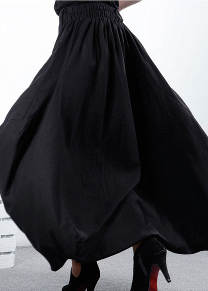 Schlichter schwarzer Winterrock mit asymmetrischem Patchwork-Design und Taschen