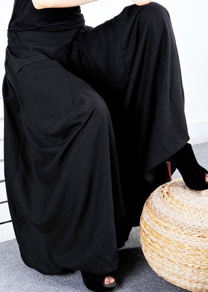 Schlichter schwarzer Winterrock mit asymmetrischem Patchwork-Design und Taschen