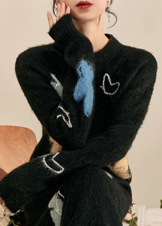 Einfacher schwarzer Stehkragenpullover mit Schmetterlingsmuster, kuscheliger Baumwollstrickpullover, Frühlings-Top