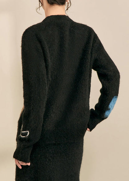 Einfacher schwarzer Stehkragenpullover mit Schmetterlingsmuster, kuscheliger Baumwollstrickpullover, Frühlings-Top