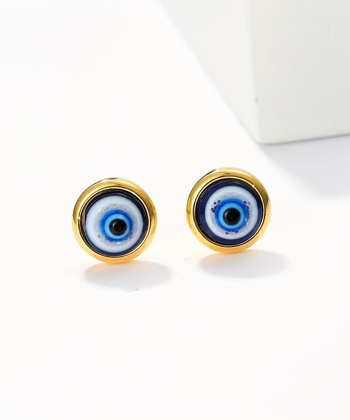 Pendientes sencillos de aleación de cobre azul con ojo de turquesa