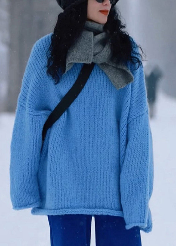 Suéter de punto de algodón grueso y acogedor de manga larga con cuello redondo azul sencillo